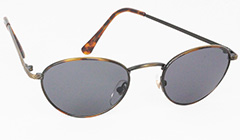Oval moderne solbrille med gråsorte glas